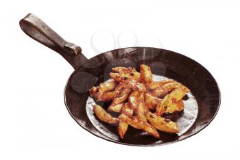 Strips of marinated chicken meat on a frying pan

