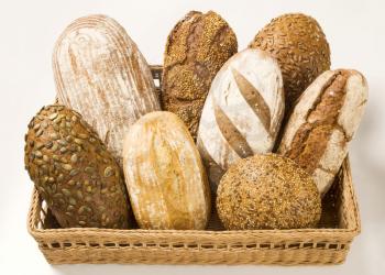 Assorted loaves of bread in a basket