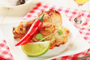 Roasted chicken drumsticks with lime and pepper