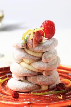 Crescent-shaped vanilla cookies with pudding and fruit
