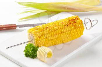 Grilled corn on the cob and butter