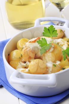 Potatoes and cream baked in a casserole dish