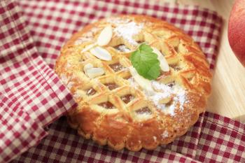 Small fruit filled pie with lattice topping