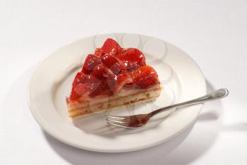 Slice of delicious strawberry cake 
- closeup
