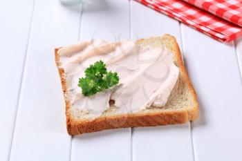 White bread with ham spread or cream cheese