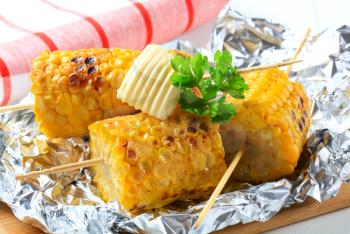 Grilled corn on the cob with butter