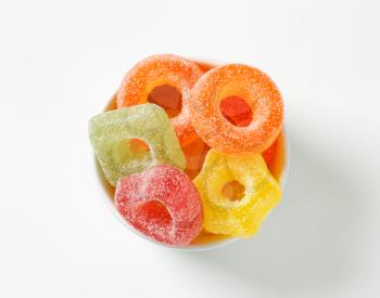 Fruit-flavored gelatin candy coated with sugar