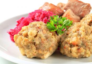 Dish of roast pork with Tyrolean dumplings and red kraut