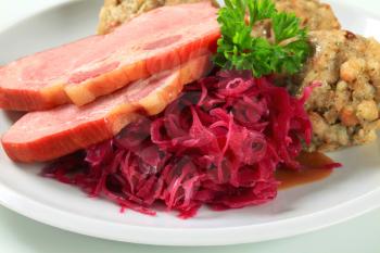 Dish of smoked pork with Tyrolean dumplings and red cabbage