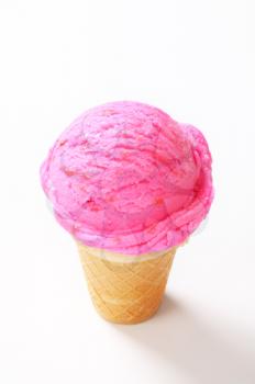 Fruit flavored ice cream cone - studio shot