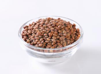 Bowl of whole red lentils