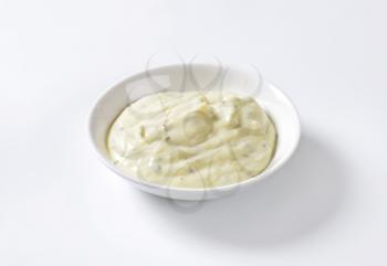 Creamy salad dressing made of mayonnaise, buttermilk, garlic, herbs, spices and grated cheese