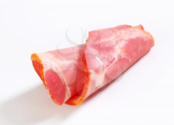 Thin slice of smoked pork neck - rolled up