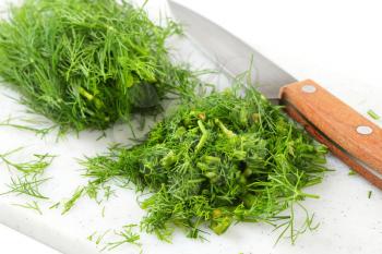 Sprigs of fresh dill weed on cutting board