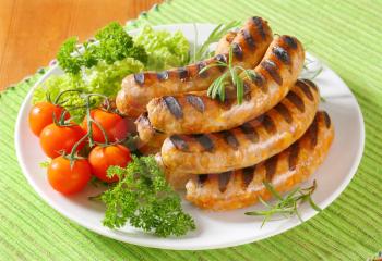 Pile of grilled German sausages