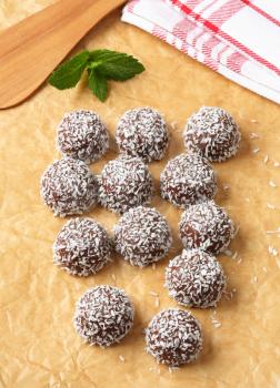 No-bake chocolate snowball cookies rolled in coconut