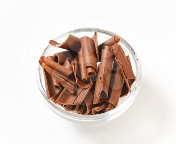 Chocolate curls in a glass bowl