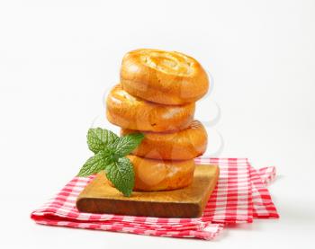Sweet bread rolls with apple and custard filling