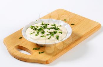 Mayonnaise dressing with chopped parsley
