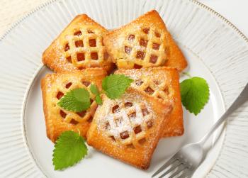 Little lattice-topped pies with apricot filling