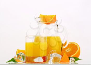 Fresh orange juice in a glass jug