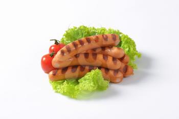 Grilled mini Vienna sausages  - studio shot