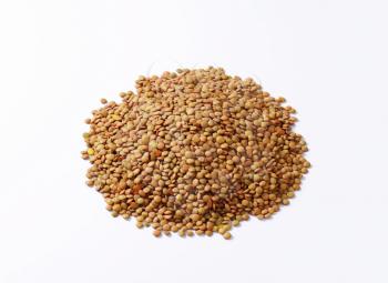 Pile of dried brown lentils