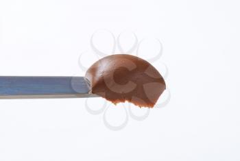 Hazelnut chocolate spread on knife