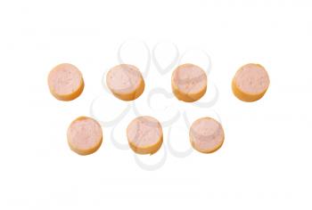 slices of raw wiener sausage isolated on white background