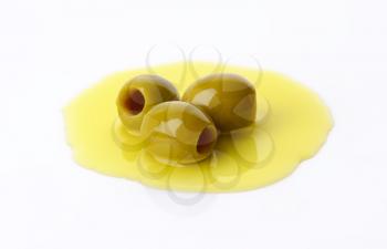 Pitted green olives in oil