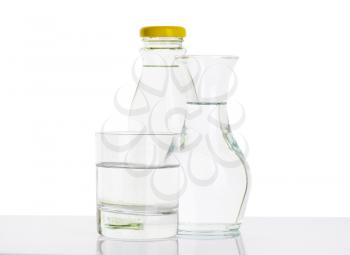 bottle, carafe and glass of fresh water