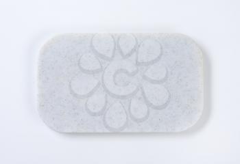 thin white plastic cutting board