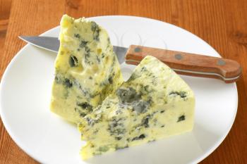 Two wedges of French blue cheese