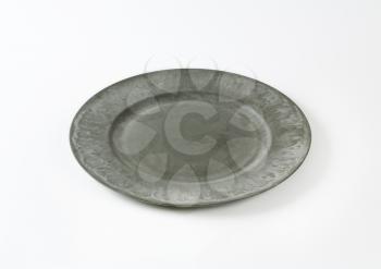 Wide rimmed gray dinner plate