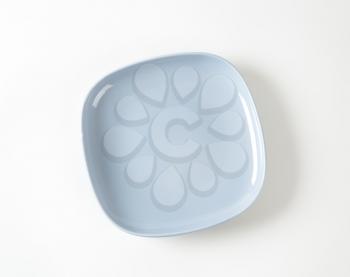 Light blue square side plate with rounded corners