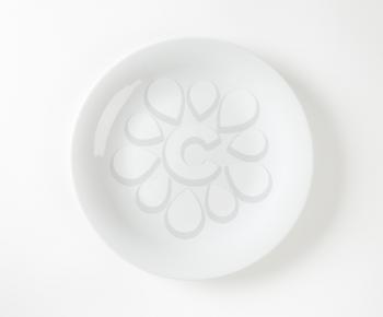 Smooth coupe-style white dinner plate