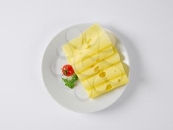 sliced Swiss cheese on plate