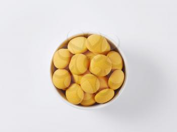 bowl of round sponge biscuits