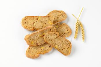 wholegrain bread slices on white background