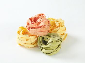 Bundles of dried ribbon pasta