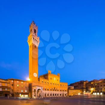 Piazza del Campo with Palazzo Pubblico at night, Siena, Italy