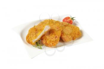 plate of breaded turkey breast pieces