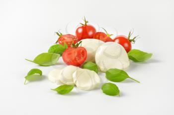 mozzarella, tomatoes and fresh basil - ingredients for caprese salad