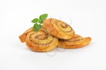 sweet cinnamon rolls on white background