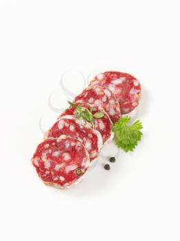Slices of French dry cured sausage