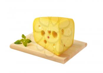 wedge of yellow medium-hard cheese with eyes