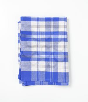 blue and white checkered dish towel on white background