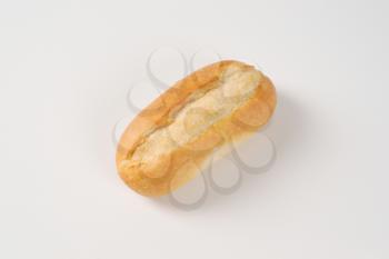 freshly baked mini baguette on white background