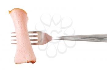 thin slice of smoked pork on fork