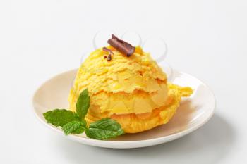 Single scoop of yellow ice cream